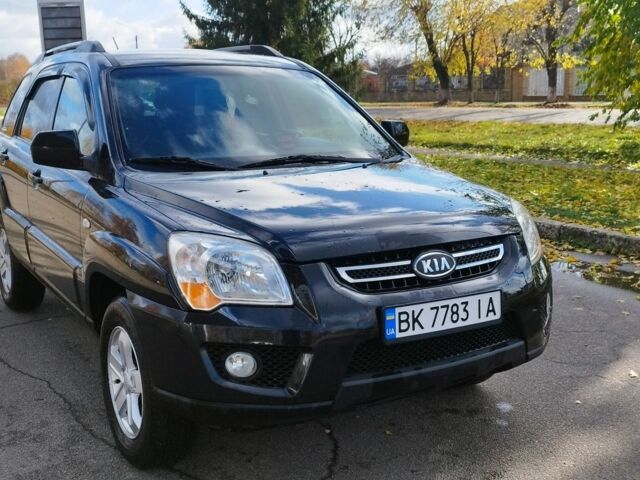 Черный Киа Sportage, объемом двигателя 2 л и пробегом 245 тыс. км за 8000 $, фото 1 на Automoto.ua