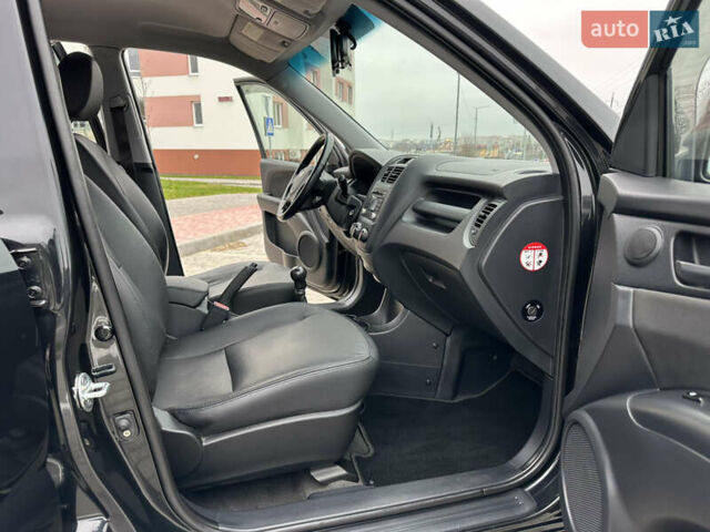 Черный Киа Sportage, объемом двигателя 2 л и пробегом 157 тыс. км за 8999 $, фото 19 на Automoto.ua