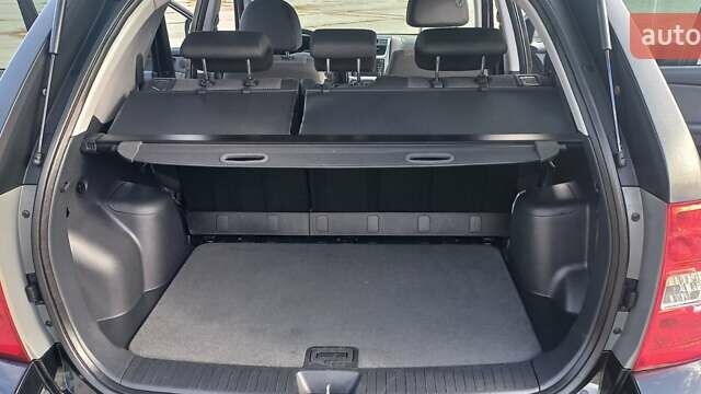 Чорний Кіа Sportage, об'ємом двигуна 2 л та пробігом 167 тис. км за 8999 $, фото 46 на Automoto.ua