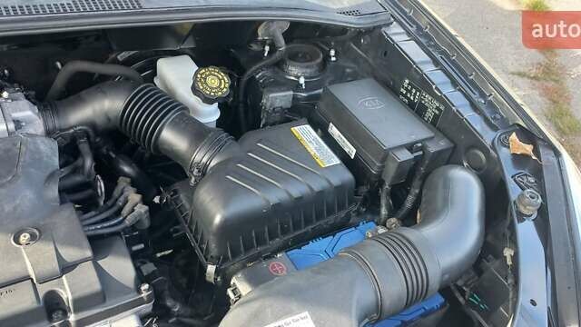 Чорний Кіа Sportage, об'ємом двигуна 2 л та пробігом 167 тис. км за 8999 $, фото 54 на Automoto.ua