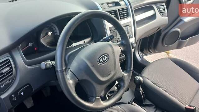 Чорний Кіа Sportage, об'ємом двигуна 2 л та пробігом 167 тис. км за 8999 $, фото 30 на Automoto.ua