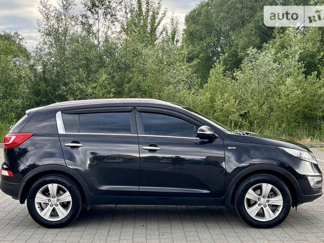 Чорний Кіа Sportage, об'ємом двигуна 2 л та пробігом 223 тис. км за 10300 $, фото 5 на Automoto.ua