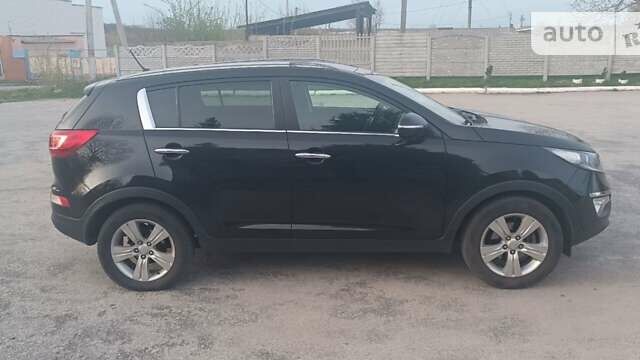 Чорний Кіа Sportage, об'ємом двигуна 1.7 л та пробігом 215 тис. км за 11600 $, фото 1 на Automoto.ua