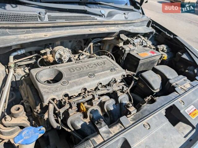 Чорний Кіа Sportage, об'ємом двигуна 2 л та пробігом 271 тис. км за 10500 $, фото 11 на Automoto.ua