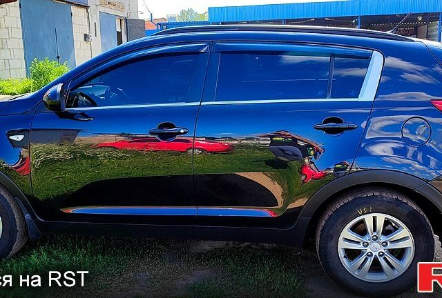 Чорний Кіа Sportage, об'ємом двигуна 2 л та пробігом 240 тис. км за 11200 $, фото 13 на Automoto.ua