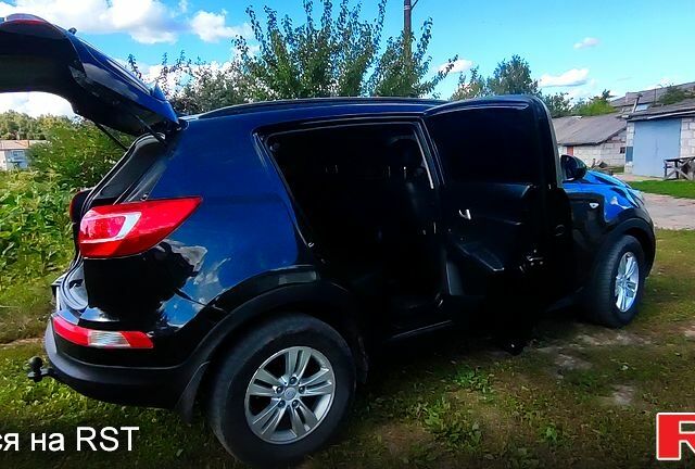 Чорний Кіа Sportage, об'ємом двигуна 2 л та пробігом 240 тис. км за 11200 $, фото 4 на Automoto.ua