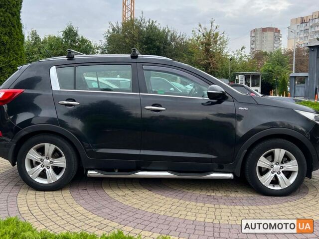 Черный Киа Sportage, объемом двигателя 2 л и пробегом 258 тыс. км за 13200 $, фото 7 на Automoto.ua