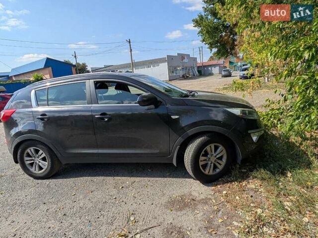 Чорний Кіа Sportage, об'ємом двигуна 2 л та пробігом 271 тис. км за 10500 $, фото 1 на Automoto.ua