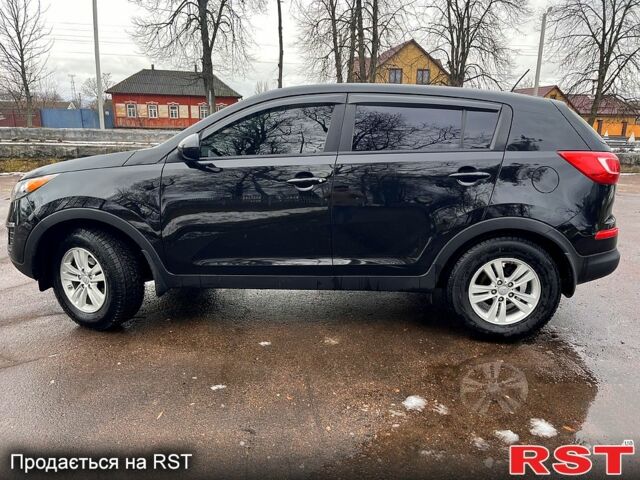 Черный Киа Sportage, объемом двигателя 2.4 л и пробегом 187 тыс. км за 12200 $, фото 7 на Automoto.ua