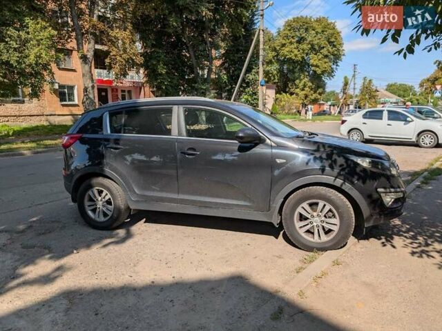 Чорний Кіа Sportage, об'ємом двигуна 2 л та пробігом 271 тис. км за 10500 $, фото 2 на Automoto.ua