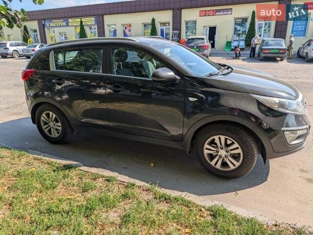 Чорний Кіа Sportage, об'ємом двигуна 2 л та пробігом 271 тис. км за 10500 $, фото 4 на Automoto.ua