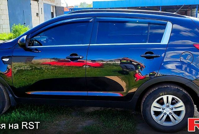 Чорний Кіа Sportage, об'ємом двигуна 2 л та пробігом 240 тис. км за 11200 $, фото 12 на Automoto.ua