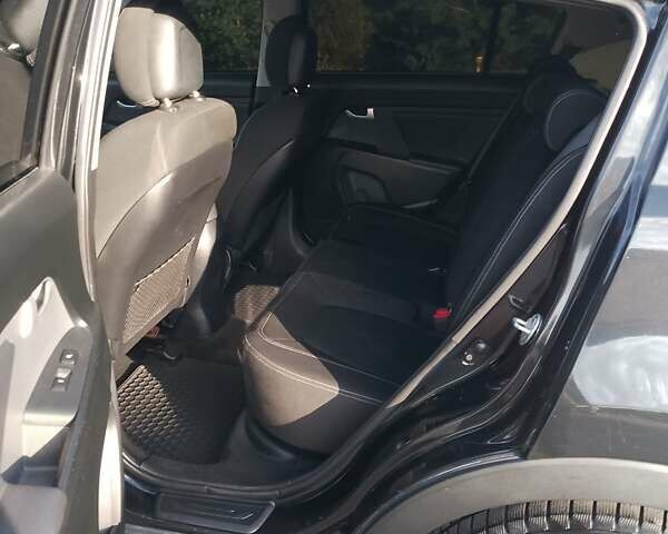 Чорний Кіа Sportage, об'ємом двигуна 1.69 л та пробігом 250 тис. км за 11300 $, фото 14 на Automoto.ua