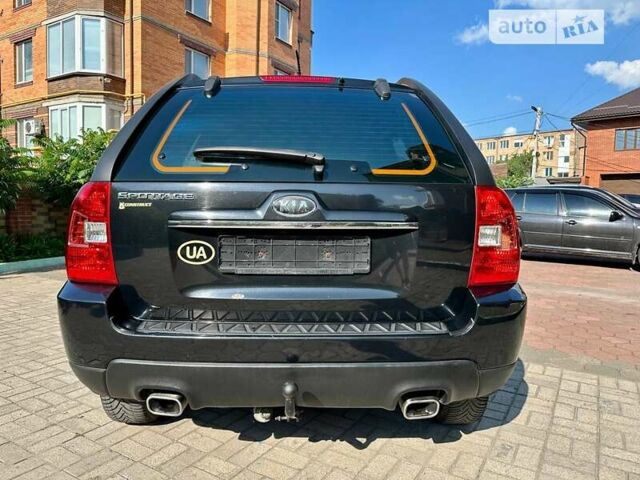 Черный Киа Sportage, объемом двигателя 2 л и пробегом 157 тыс. км за 9500 $, фото 9 на Automoto.ua