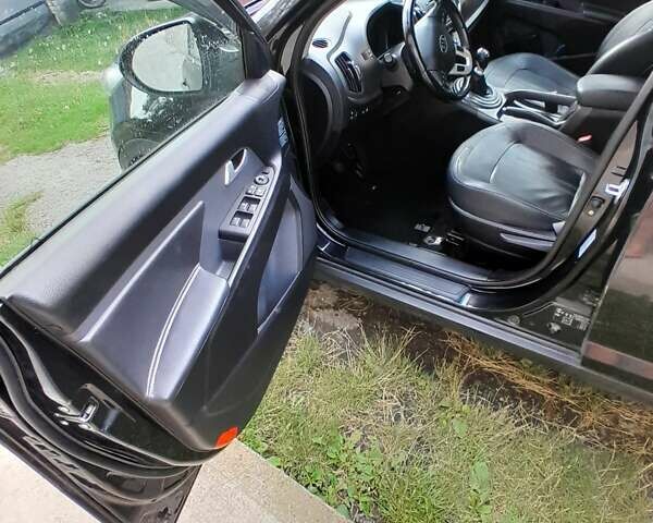 Чорний Кіа Sportage, об'ємом двигуна 1.69 л та пробігом 172 тис. км за 13500 $, фото 3 на Automoto.ua
