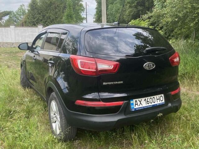 Чорний Кіа Sportage, об'ємом двигуна 2.4 л та пробігом 165 тис. км за 10000 $, фото 2 на Automoto.ua