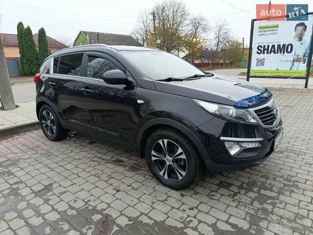 Черный Киа Sportage, объемом двигателя 2 л и пробегом 153 тыс. км за 11800 $, фото 6 на Automoto.ua