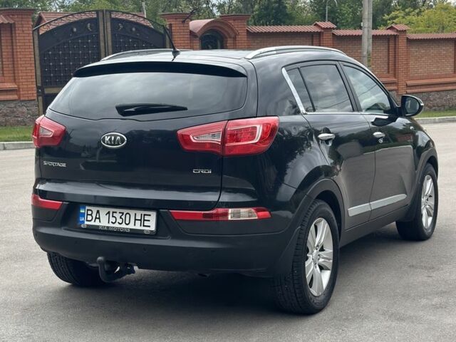 Чорний Кіа Sportage, об'ємом двигуна 2 л та пробігом 218 тис. км за 12799 $, фото 8 на Automoto.ua