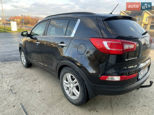 Черный Киа Sportage, объемом двигателя 2 л и пробегом 244 тыс. км за 13900 $, фото 10 на Automoto.ua