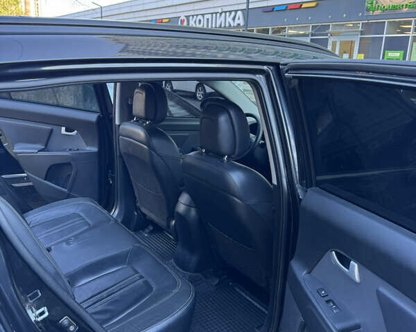 Черный Киа Sportage, объемом двигателя 2 л и пробегом 225 тыс. км за 13750 $, фото 14 на Automoto.ua