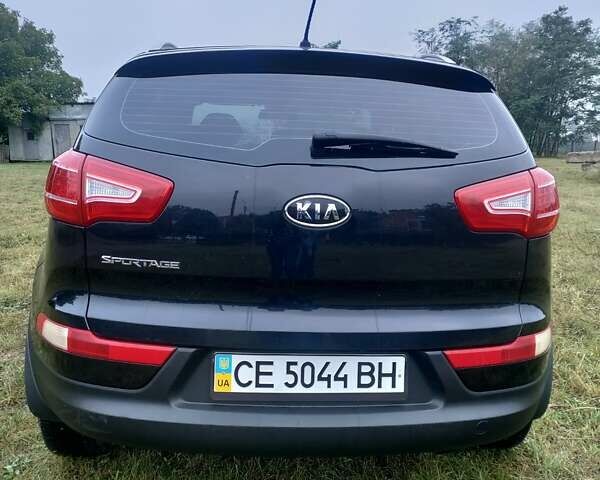 Чорний Кіа Sportage, об'ємом двигуна 2 л та пробігом 150 тис. км за 11500 $, фото 5 на Automoto.ua
