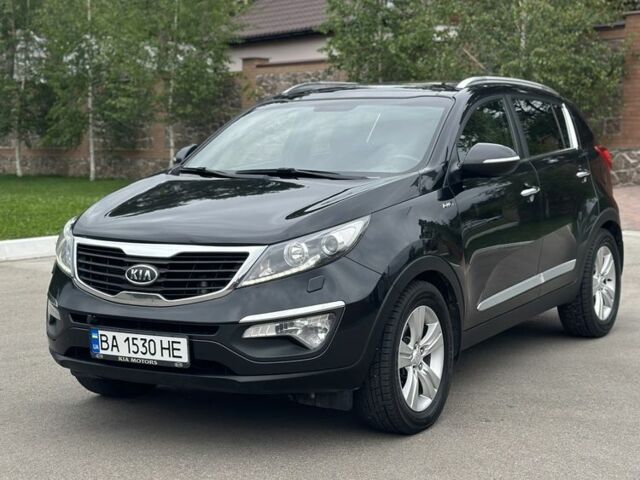 Чорний Кіа Sportage, об'ємом двигуна 2 л та пробігом 218 тис. км за 12799 $, фото 2 на Automoto.ua