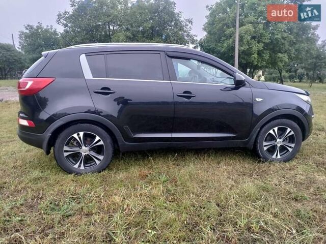 Чорний Кіа Sportage, об'ємом двигуна 2 л та пробігом 150 тис. км за 11500 $, фото 7 на Automoto.ua