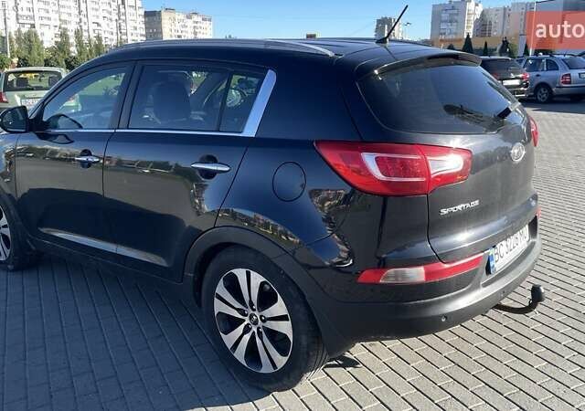 Черный Киа Sportage, объемом двигателя 2 л и пробегом 308 тыс. км за 12500 $, фото 2 на Automoto.ua