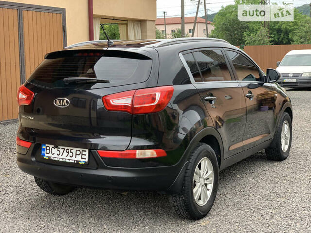 Черный Киа Sportage, объемом двигателя 2 л и пробегом 203 тыс. км за 11900 $, фото 3 на Automoto.ua