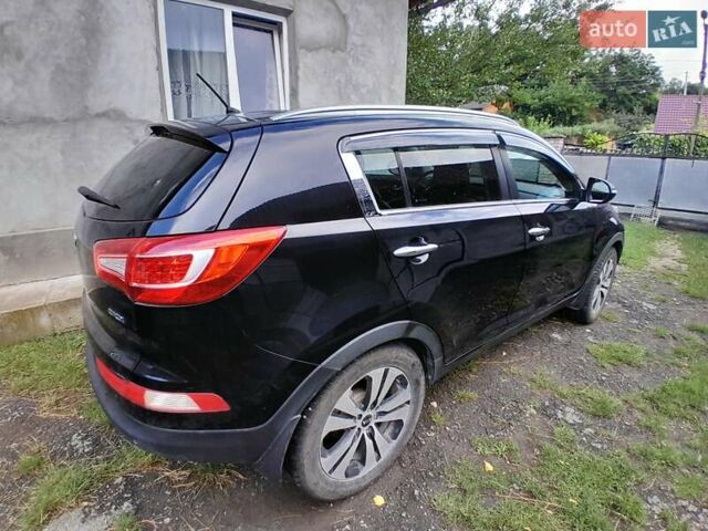 Чорний Кіа Sportage, об'ємом двигуна 1.69 л та пробігом 172 тис. км за 13500 $, фото 11 на Automoto.ua