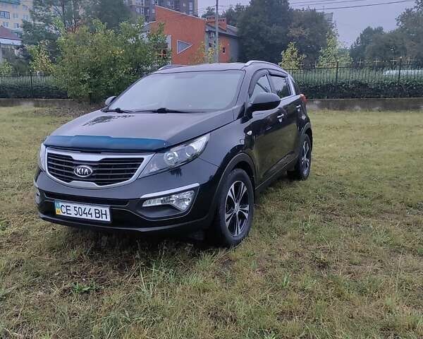 Чорний Кіа Sportage, об'ємом двигуна 2 л та пробігом 150 тис. км за 11500 $, фото 1 на Automoto.ua