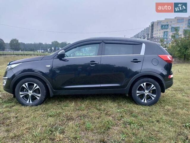 Чорний Кіа Sportage, об'ємом двигуна 2 л та пробігом 150 тис. км за 11500 $, фото 2 на Automoto.ua