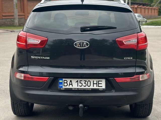 Чорний Кіа Sportage, об'ємом двигуна 2 л та пробігом 218 тис. км за 12799 $, фото 7 на Automoto.ua