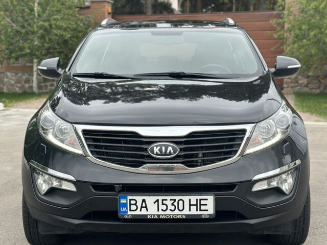 Чорний Кіа Sportage, об'ємом двигуна 2 л та пробігом 218 тис. км за 12799 $, фото 1 на Automoto.ua