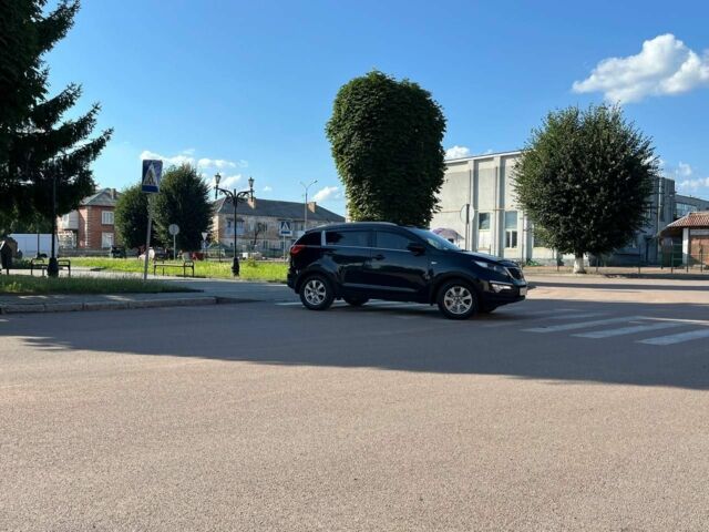 Чорний Кіа Sportage, об'ємом двигуна 2 л та пробігом 184 тис. км за 12100 $, фото 1 на Automoto.ua