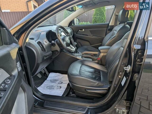 Черный Киа Sportage, объемом двигателя 1.7 л и пробегом 150 тыс. км за 12500 $, фото 24 на Automoto.ua