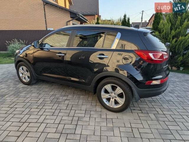 Черный Киа Sportage, объемом двигателя 1.7 л и пробегом 150 тыс. км за 12500 $, фото 23 на Automoto.ua