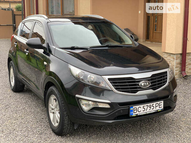 Черный Киа Sportage, объемом двигателя 2 л и пробегом 203 тыс. км за 11900 $, фото 2 на Automoto.ua