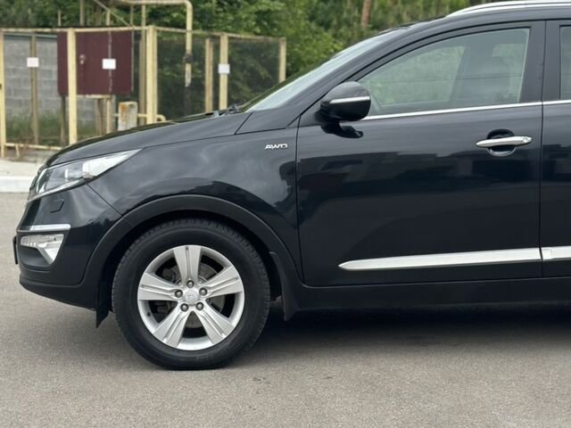 Чорний Кіа Sportage, об'ємом двигуна 2 л та пробігом 218 тис. км за 12799 $, фото 4 на Automoto.ua