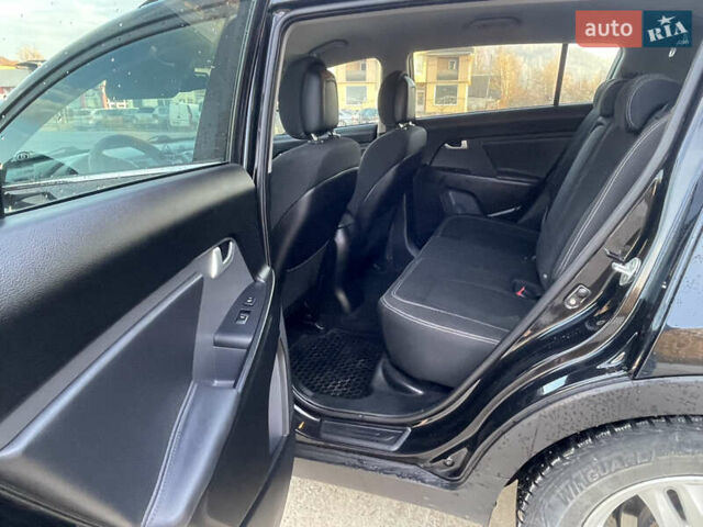 Черный Киа Sportage, объемом двигателя 2 л и пробегом 244 тыс. км за 13900 $, фото 12 на Automoto.ua