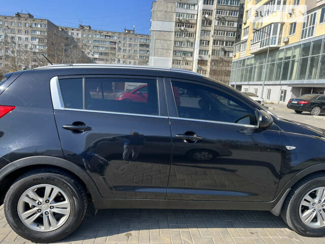 Черный Киа Sportage, объемом двигателя 2 л и пробегом 150 тыс. км за 12500 $, фото 1 на Automoto.ua