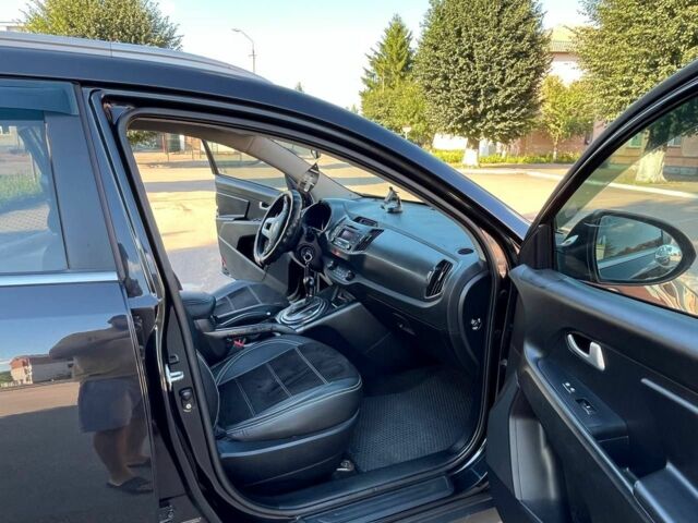 Чорний Кіа Sportage, об'ємом двигуна 2 л та пробігом 184 тис. км за 12100 $, фото 9 на Automoto.ua