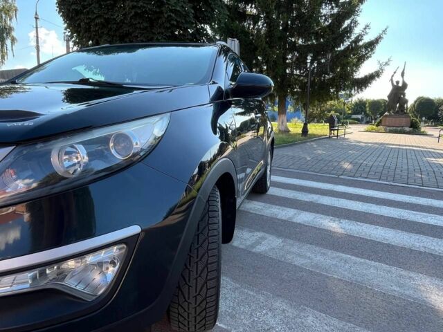 Чорний Кіа Sportage, об'ємом двигуна 2 л та пробігом 184 тис. км за 12100 $, фото 4 на Automoto.ua
