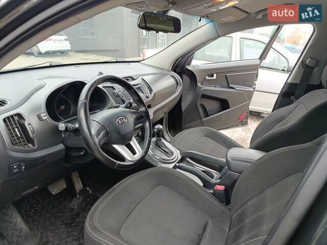 Черный Киа Sportage, объемом двигателя 2 л и пробегом 153 тыс. км за 11800 $, фото 14 на Automoto.ua
