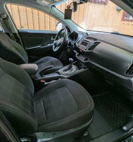 Чорний Кіа Sportage, об'ємом двигуна 2 л та пробігом 150 тис. км за 11500 $, фото 15 на Automoto.ua