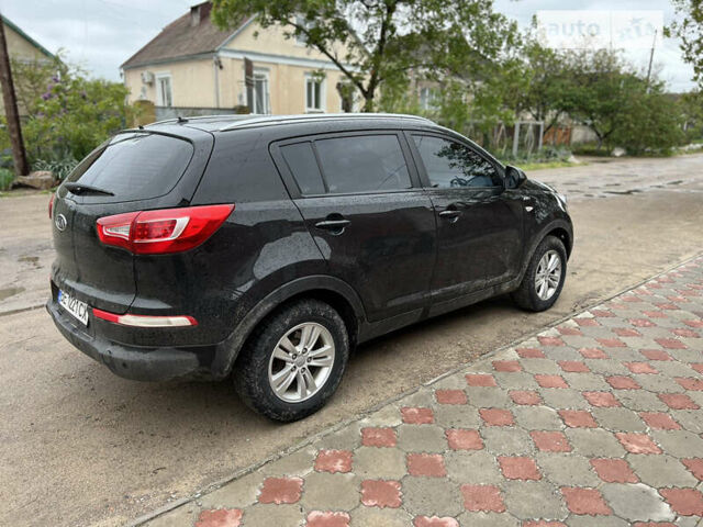 Чорний Кіа Sportage, об'ємом двигуна 2 л та пробігом 226 тис. км за 11000 $, фото 4 на Automoto.ua