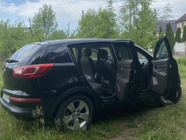 Чорний Кіа Sportage, об'ємом двигуна 2.4 л та пробігом 165 тис. км за 10000 $, фото 1 на Automoto.ua