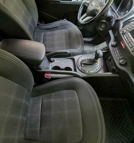 Чорний Кіа Sportage, об'ємом двигуна 2 л та пробігом 150 тис. км за 11500 $, фото 16 на Automoto.ua