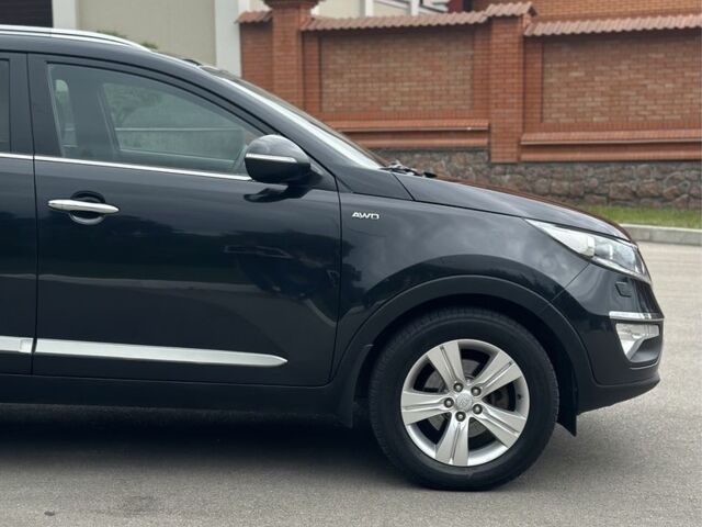 Чорний Кіа Sportage, об'ємом двигуна 2 л та пробігом 218 тис. км за 12799 $, фото 12 на Automoto.ua