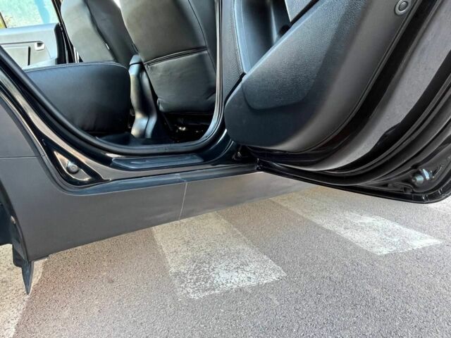 Чорний Кіа Sportage, об'ємом двигуна 2 л та пробігом 184 тис. км за 12100 $, фото 16 на Automoto.ua